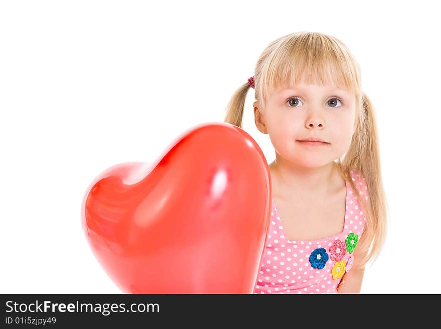 Girl in pink dress and with red heart-shaped balloon. Girl in pink dress and with red heart-shaped balloon