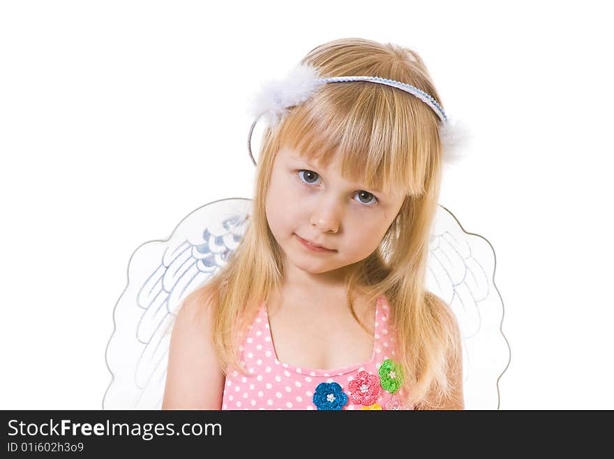 Girl in pink dress and with angel wings on white background