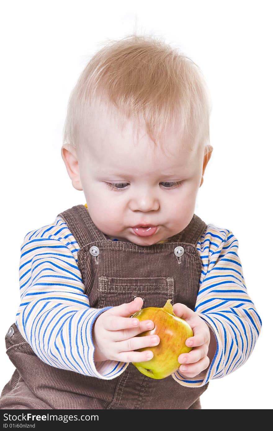 Little boy with big apple on white background