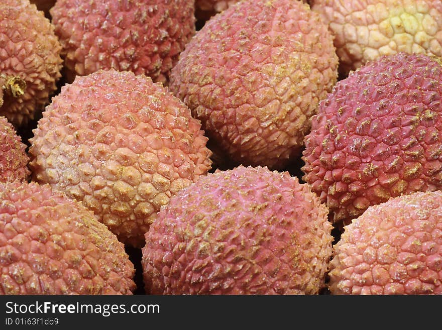 Closeup of fresh litchis as background. Closeup of fresh litchis as background