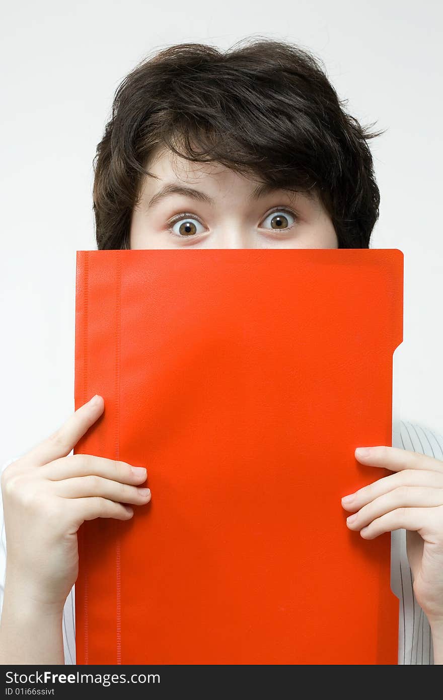 Amazed woman with red file