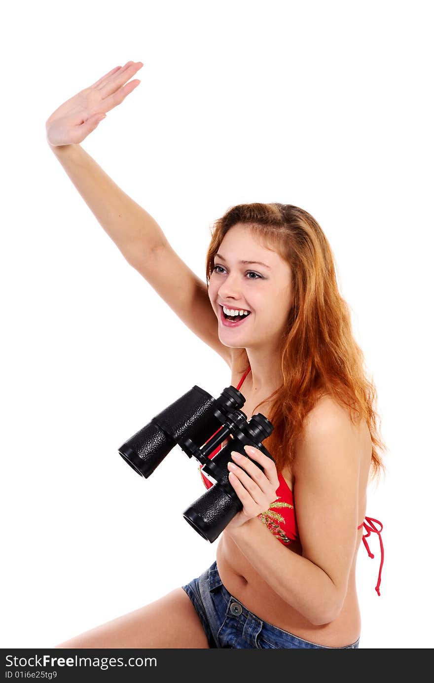 Young beautiful  girl in swimsuit on white background with binoculars.