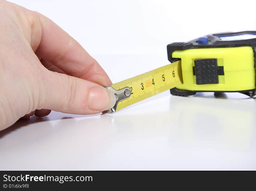 A Tape Measure white female hand