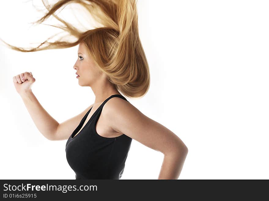 Beatiful blond women woman lifting a weight