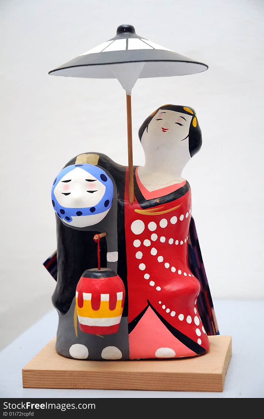 Traditional Japanese dolls on white background