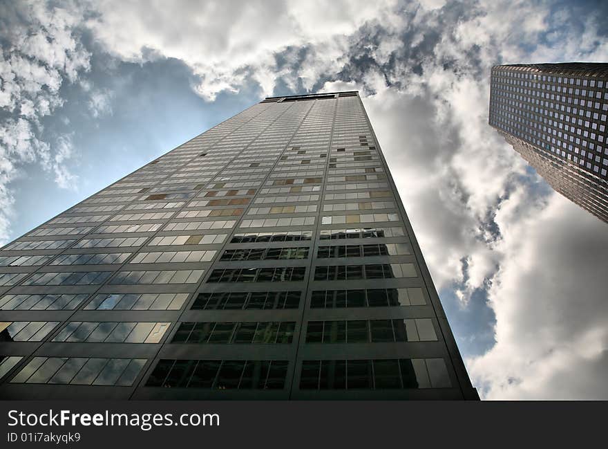 Skyscrapers Scathed by Ike against cloudy sky