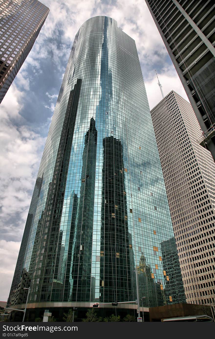 Tall Glass Skyscraper Against blue sky