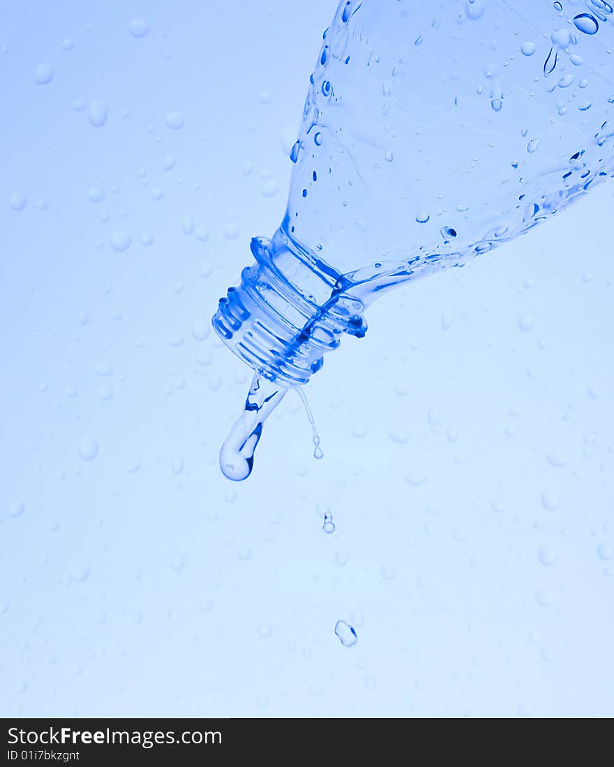 Bottle with creative splashing water. Bottle with creative splashing water