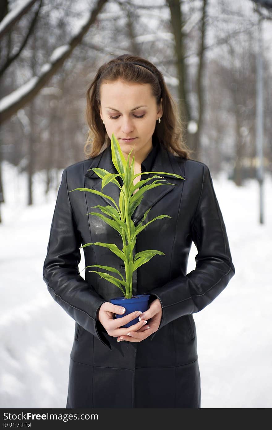 Girl with the green plant