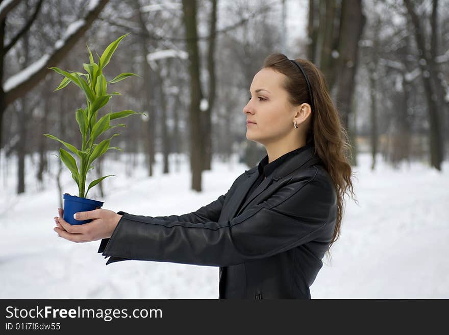 Girl with the green plant