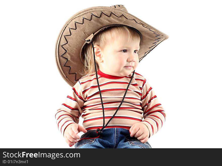 Little boy in cowboy hat isolated on white background