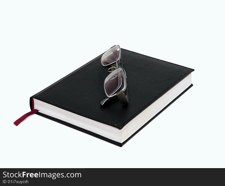 Notebook and glasses