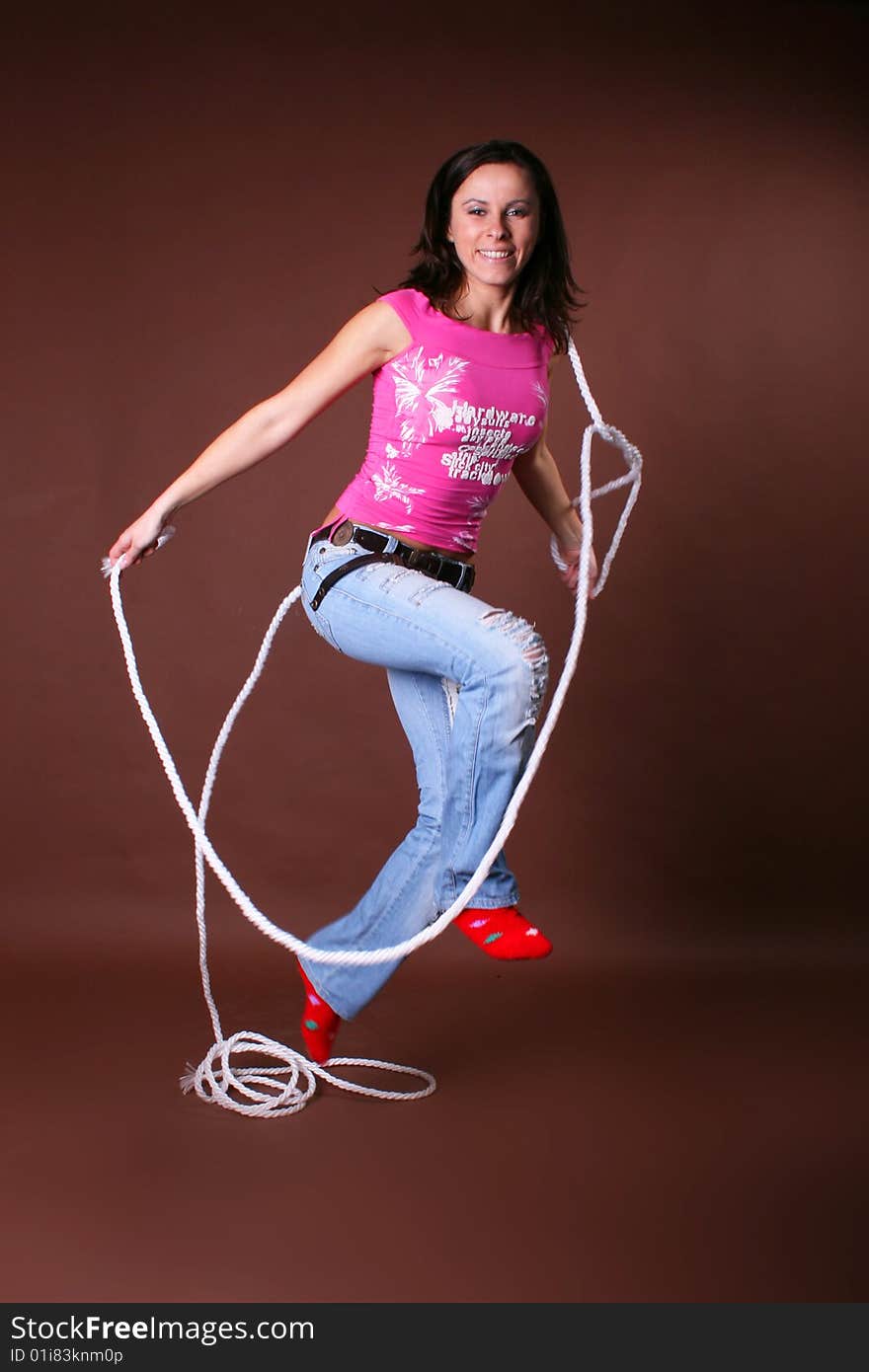 The young beautiful girl during active leisure on a white background