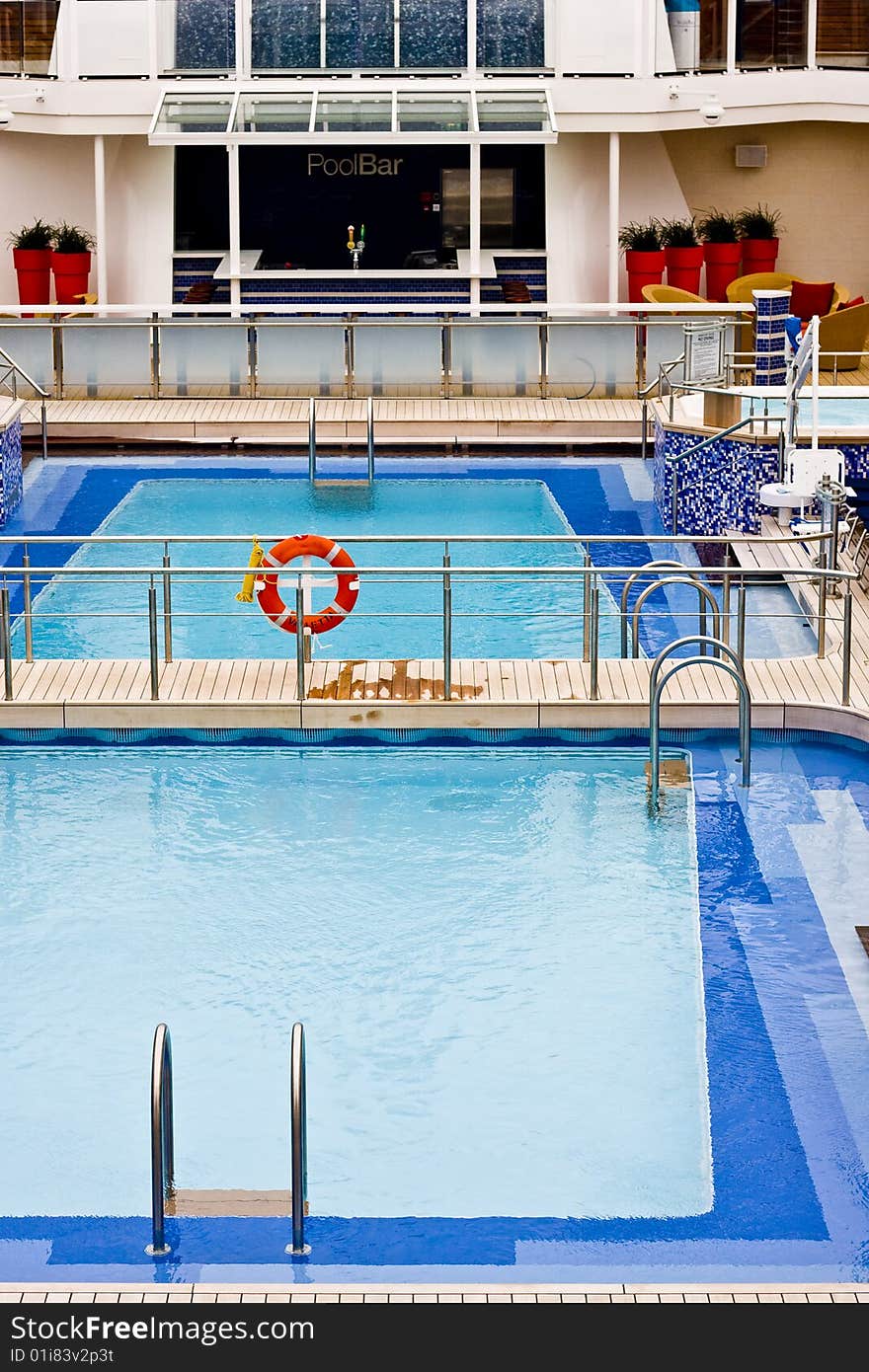 A nice swimming pool on the deck of a luxury swimming pool. A nice swimming pool on the deck of a luxury swimming pool