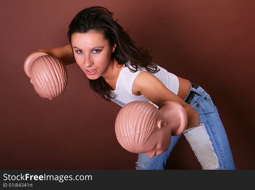 The young beautiful girl during active leisure on a white background