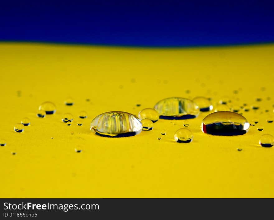 Water like crystal. Macro photograph of droplets of water. Water like crystal. Macro photograph of droplets of water.