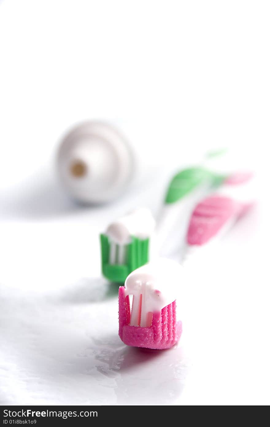 Toothpaste and toothbrushes closeup. dental care