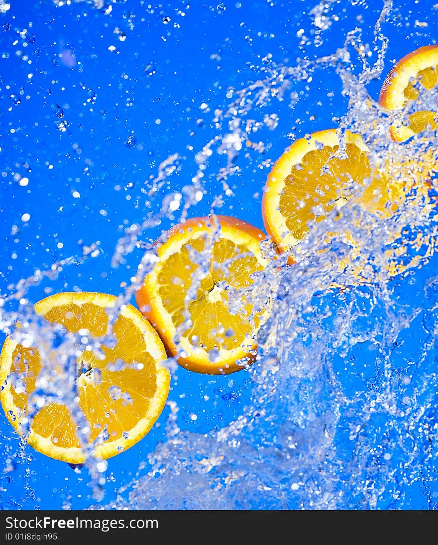 Orange with creative splashing water