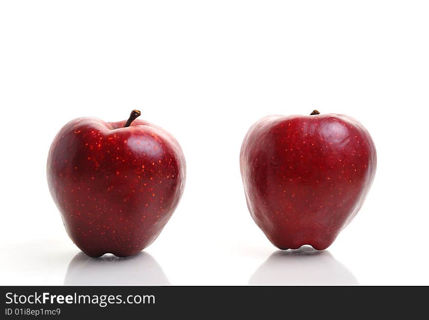 Two red apple on white background