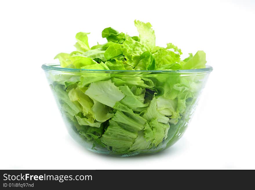 Green salad on bowl on white background