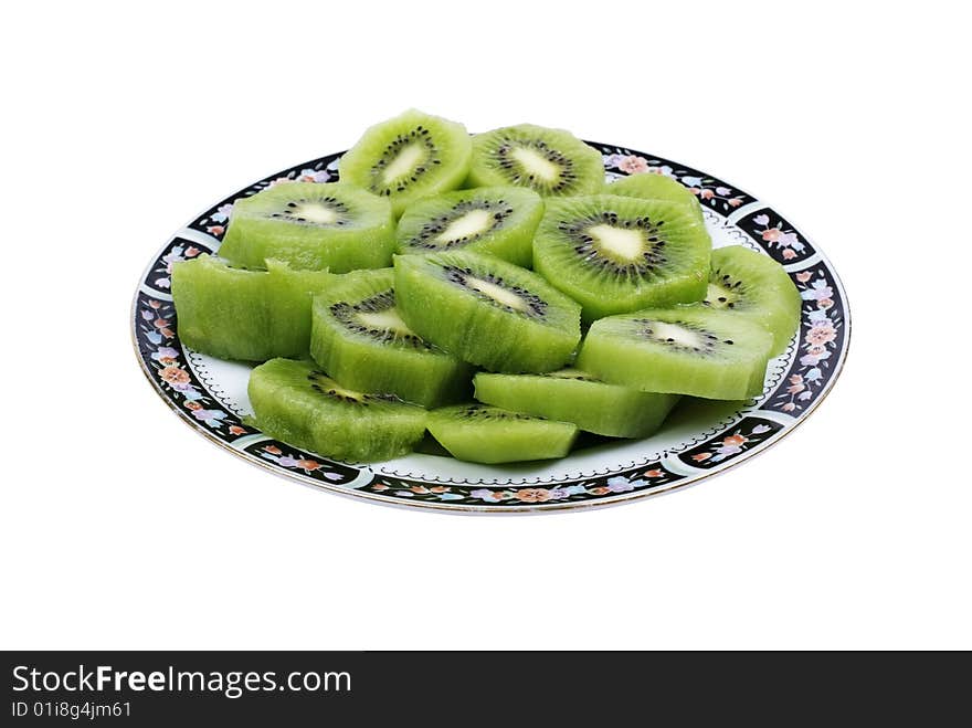 Sliced kiwi on plate.