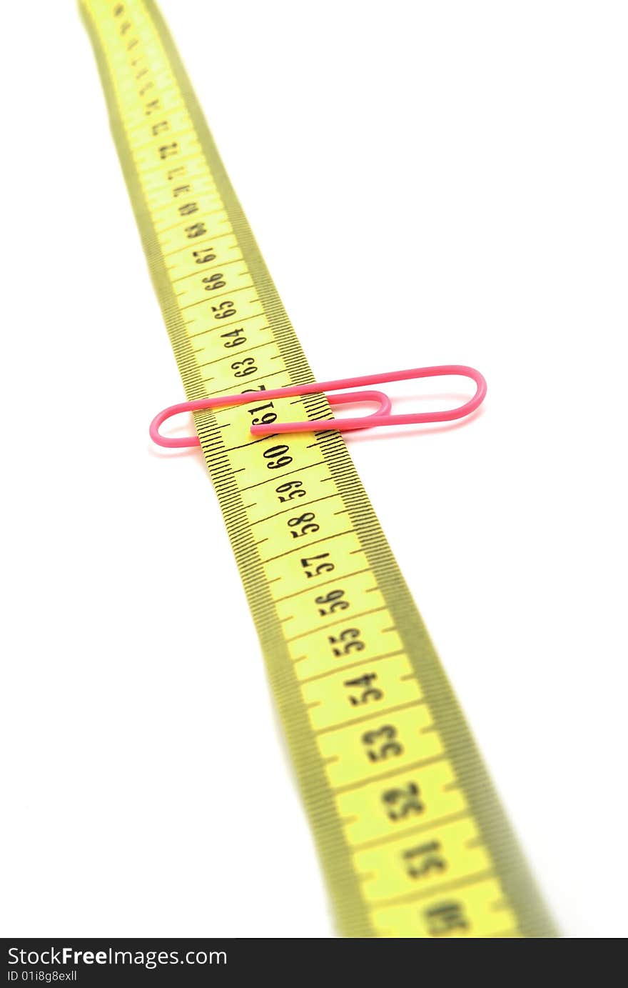 Tape measure labelled with a paper clip. Tape measure labelled with a paper clip