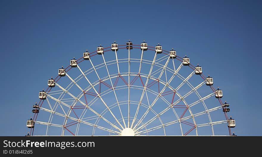 Half joy wheel and blue sky