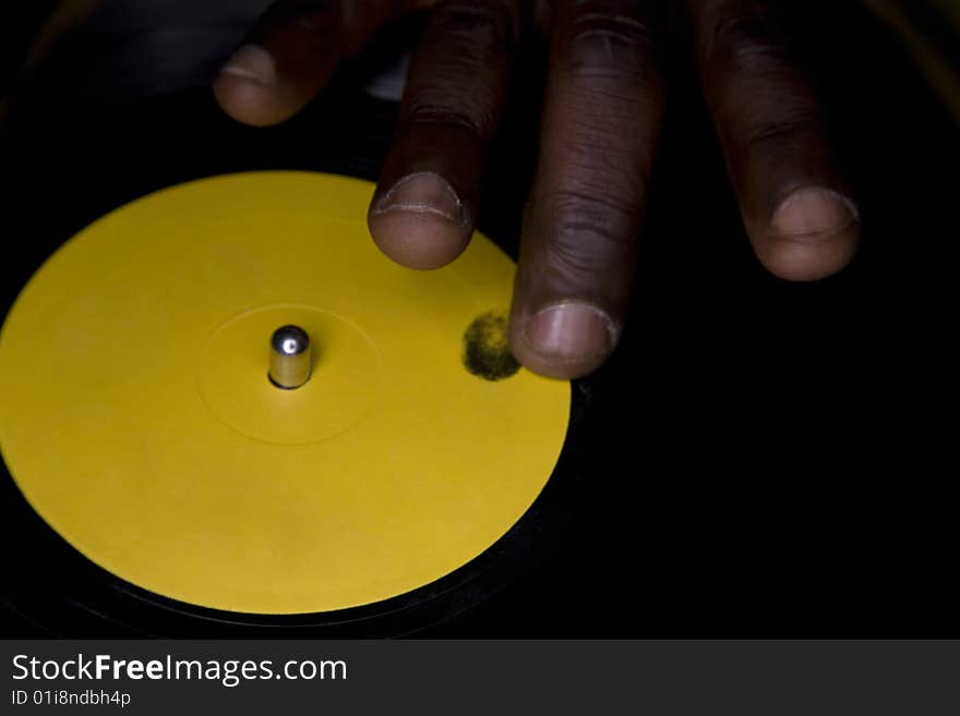 Close up of a hand on the lp. Close up of a hand on the lp