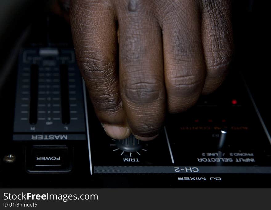 Hand Of The Dj On The Mixer