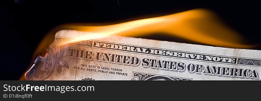 Dollar in fire. Finance crisis