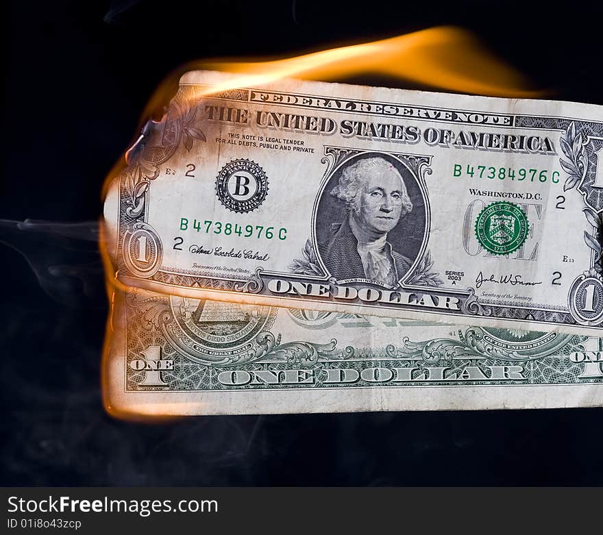 Dollar in fire. Finance crisis