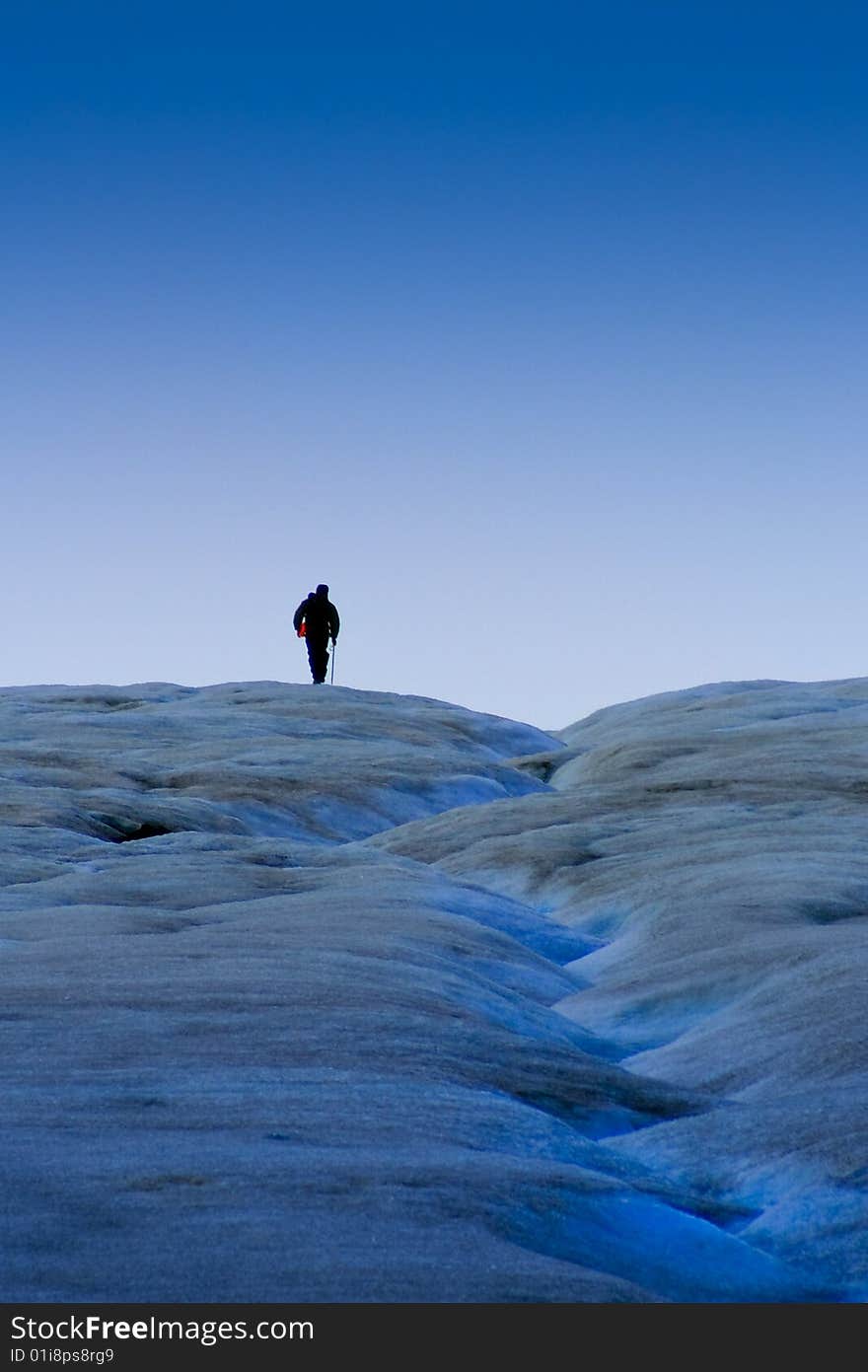 Lone Hiker on Columbia Glacier in Canada. Lone Hiker on Columbia Glacier in Canada