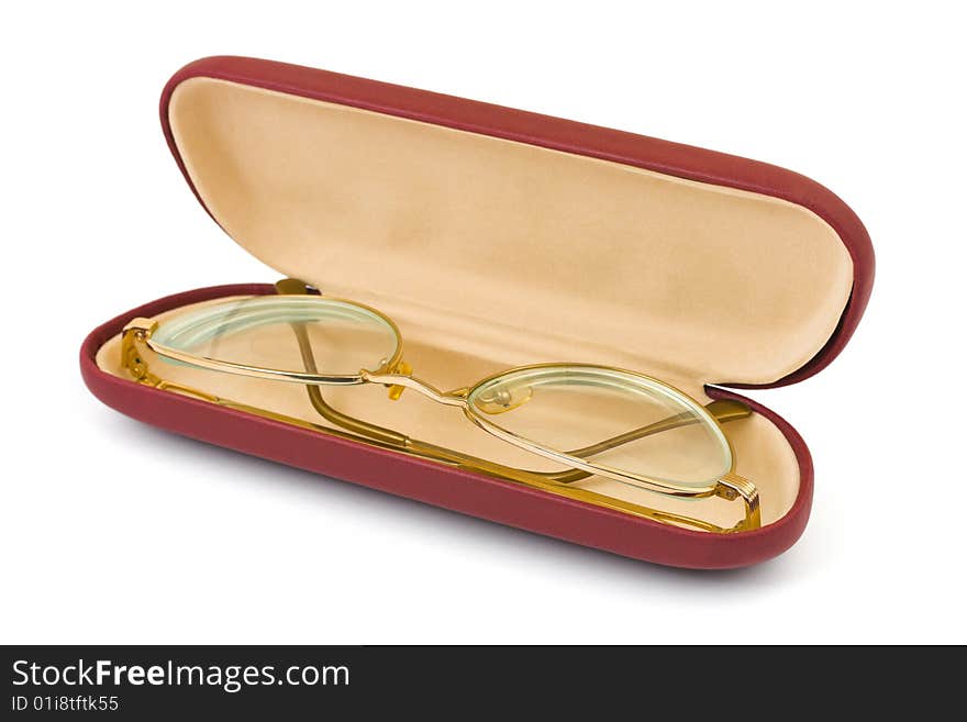 Retro golden glasses in case isolated on white background