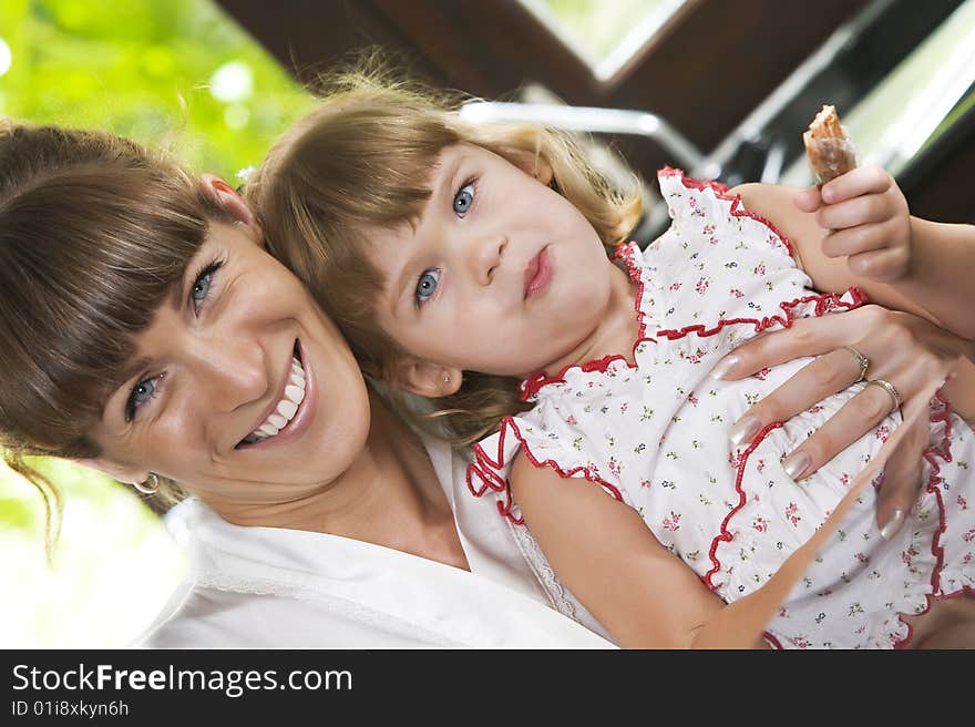 Portrait of beautiful young woman with her daughter. Portrait of beautiful young woman with her daughter