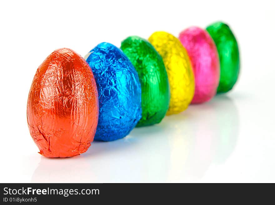 Chocolate easter eggs isolated against a white background