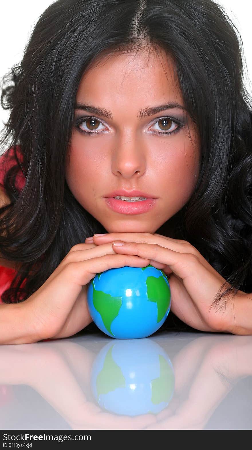 Beautiful girl and small globes. Beautiful girl and small globes