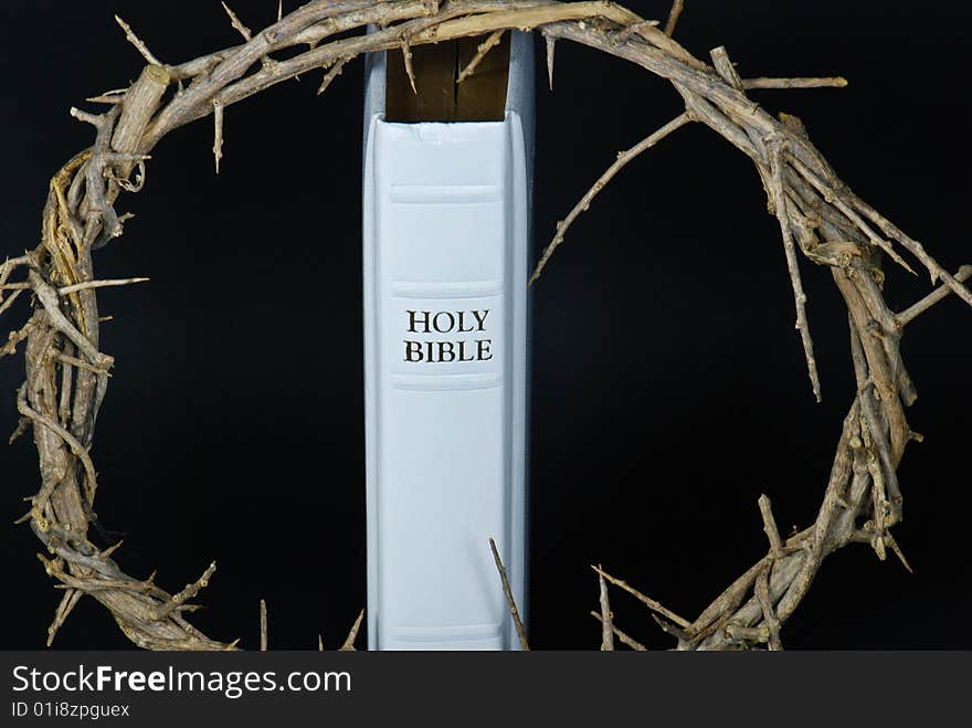 Crown of thorns on a white Holy Bible. Crown of thorns on a white Holy Bible.