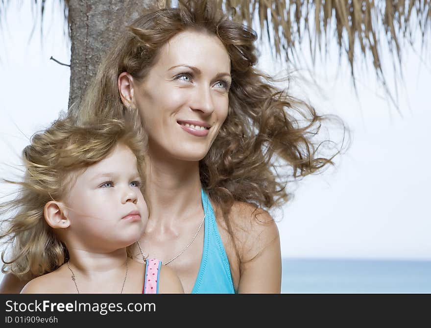 Portrait of  beautiful young woman with her daughter. Portrait of  beautiful young woman with her daughter