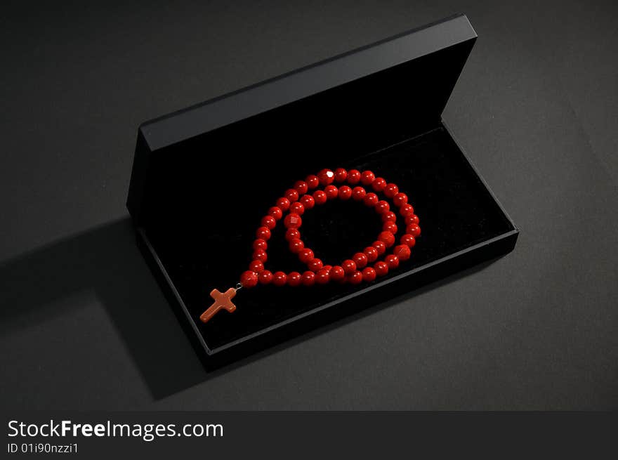 Red coral necklace with black casket