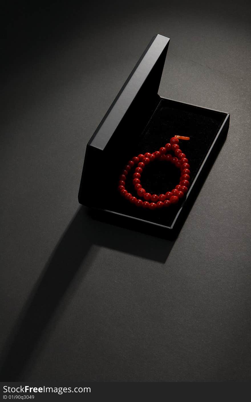 Red coral necklace with black casket