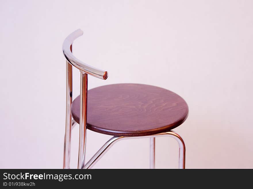 Stool over white in the studio