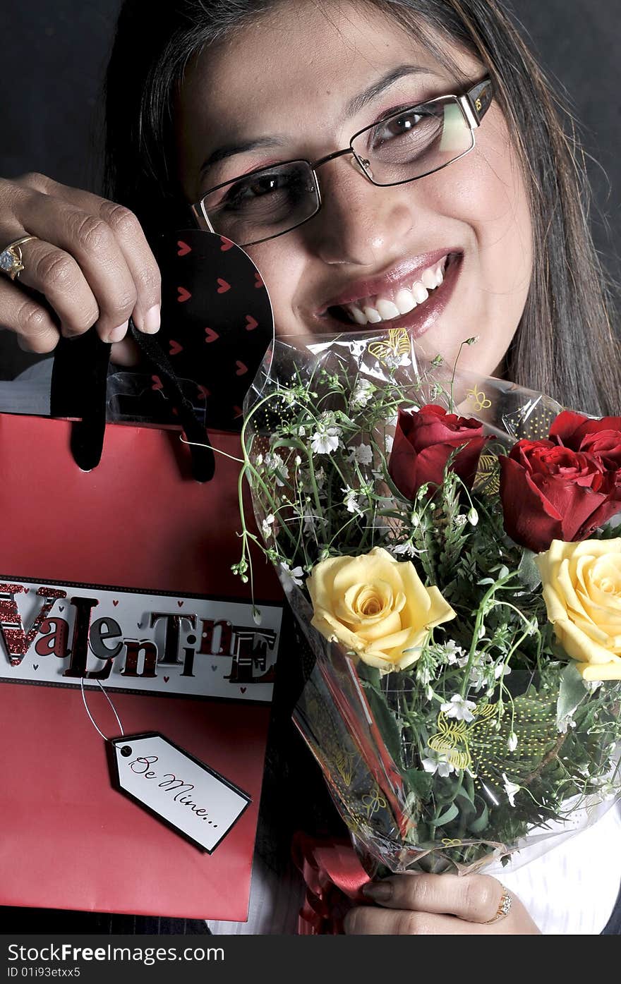 Girl with flower and bag.