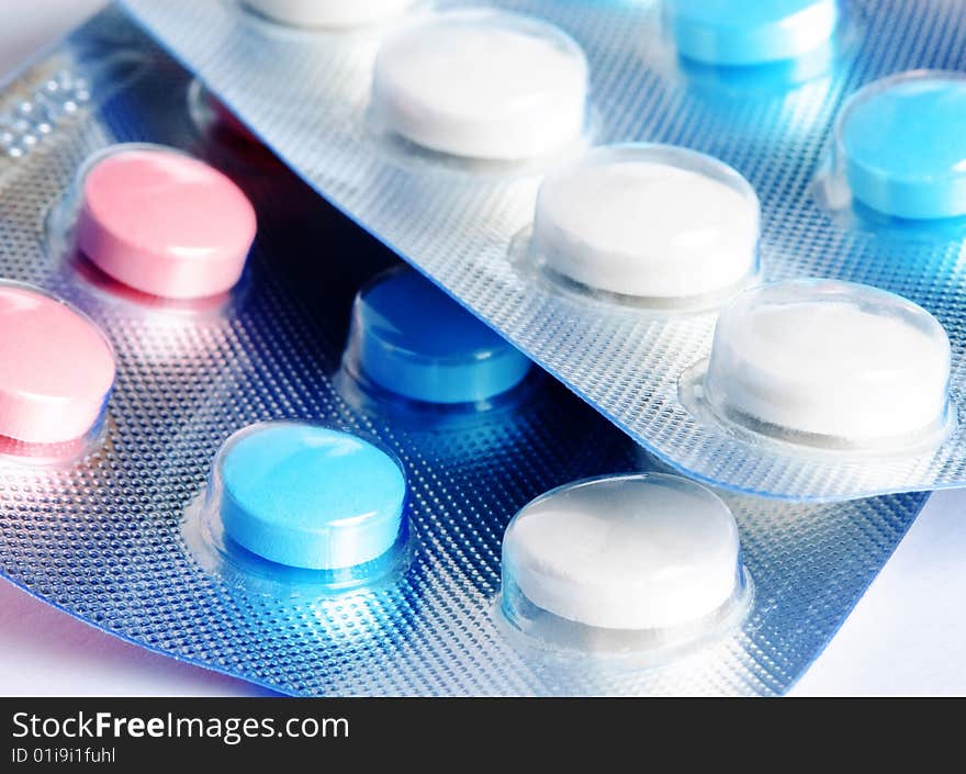 Close-up medical pills and tablets background