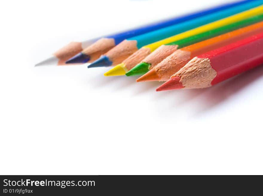 Coloured pencils isolated on white background