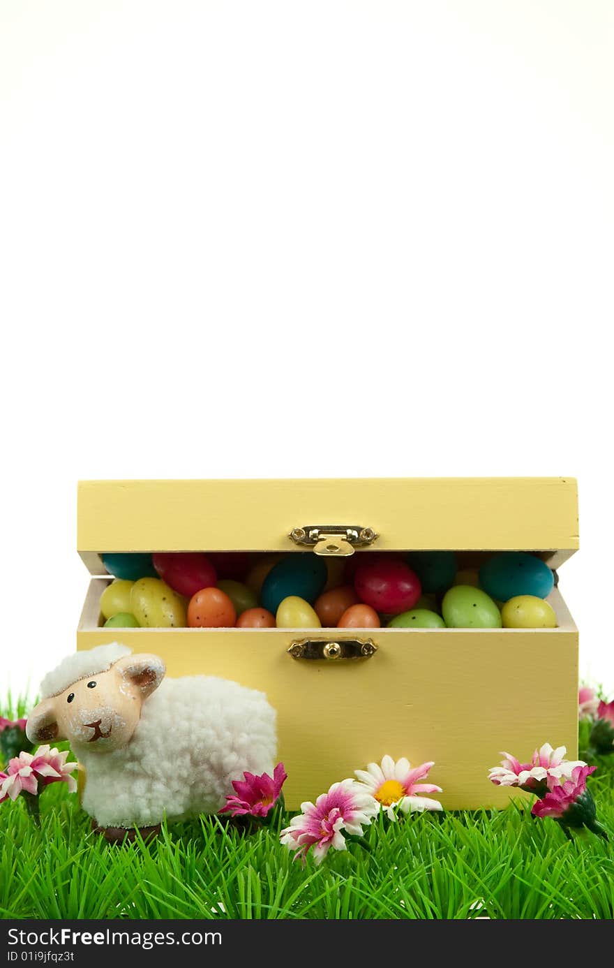 Box of easter eggs and cute sheep