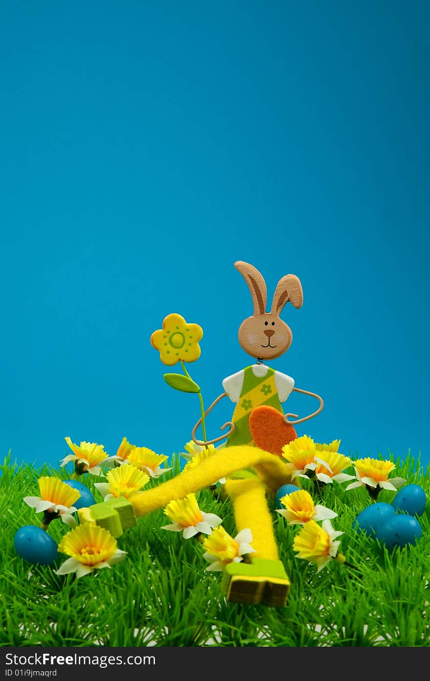 Cute easter bunny with on grass in spring