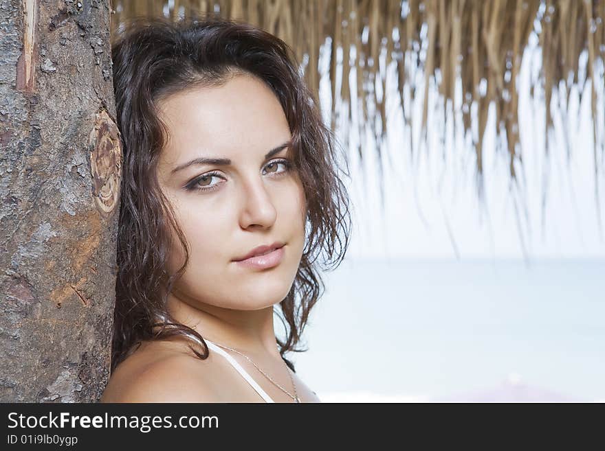 Portrait of a young gorgeous female in tropical environment. Portrait of a young gorgeous female in tropical environment