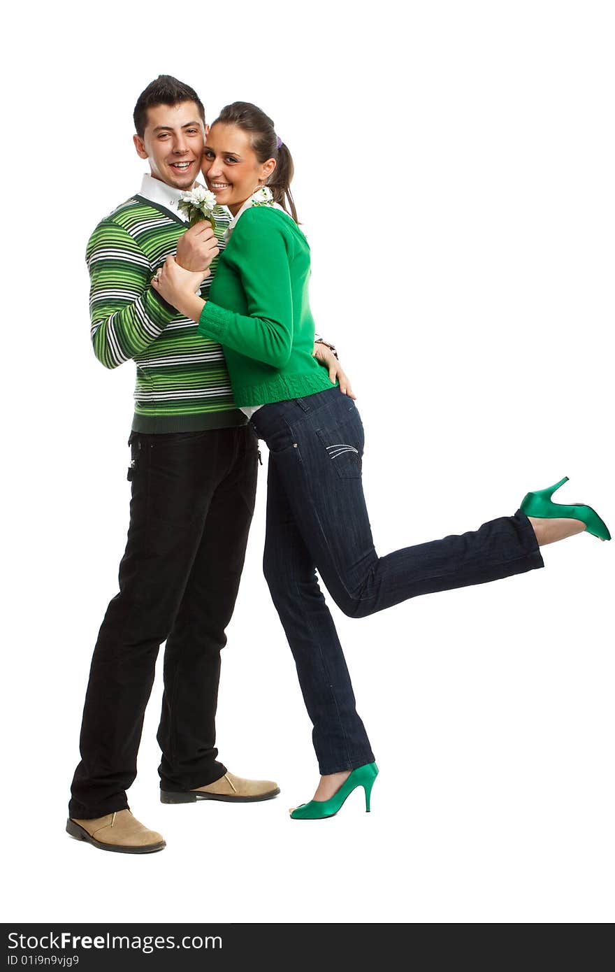 Happy young couple having fun, isolated on white