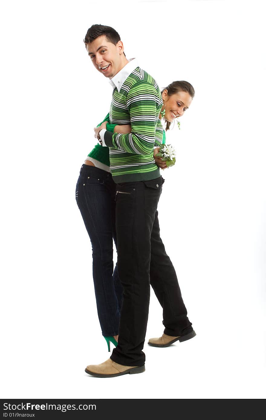 Happy young couple having fun, isolated on white