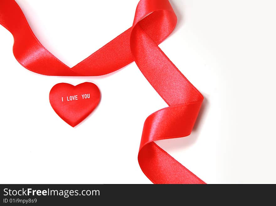 Read heart and red ribbon on white it is isolated. Read heart and red ribbon on white it is isolated